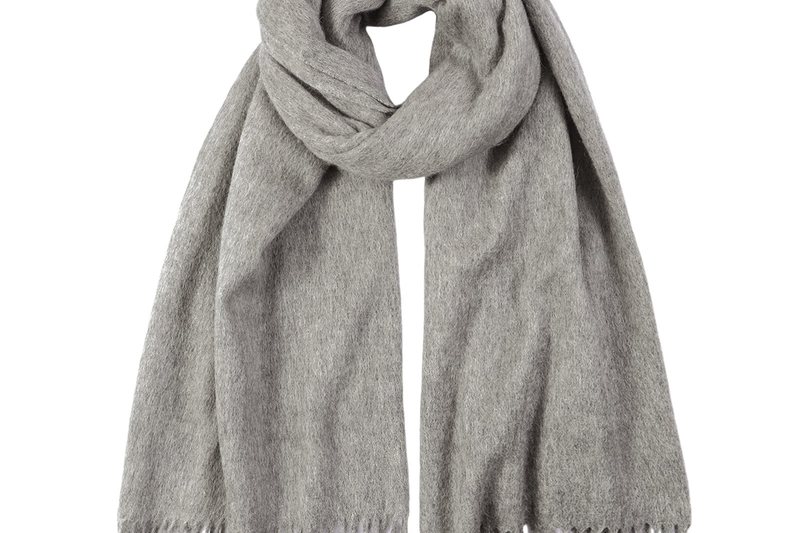 Grey wool scarf with fringed ends, folded and tied
